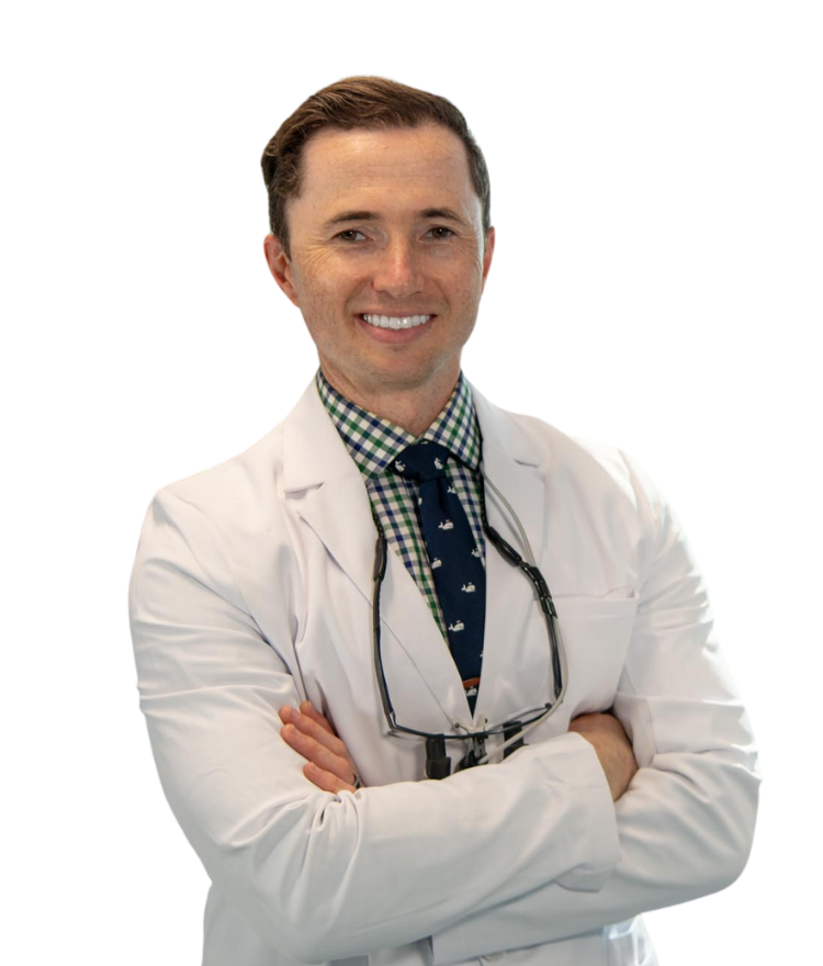 Dr. Gregory Shvartsman in white lab coat stand with arms crossed, Confident and professional vibe.